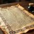Een representatieve afbeelding van de Magna Carta met inkt en een veer