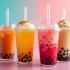 Verschillende smaken bubble tea in kleurrijke glazen.